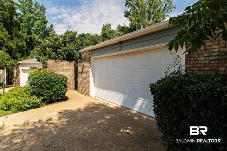 12 Stonebridge Court Mobile, AL 36608 - Photo 35 of 38 Garage featuring driveway