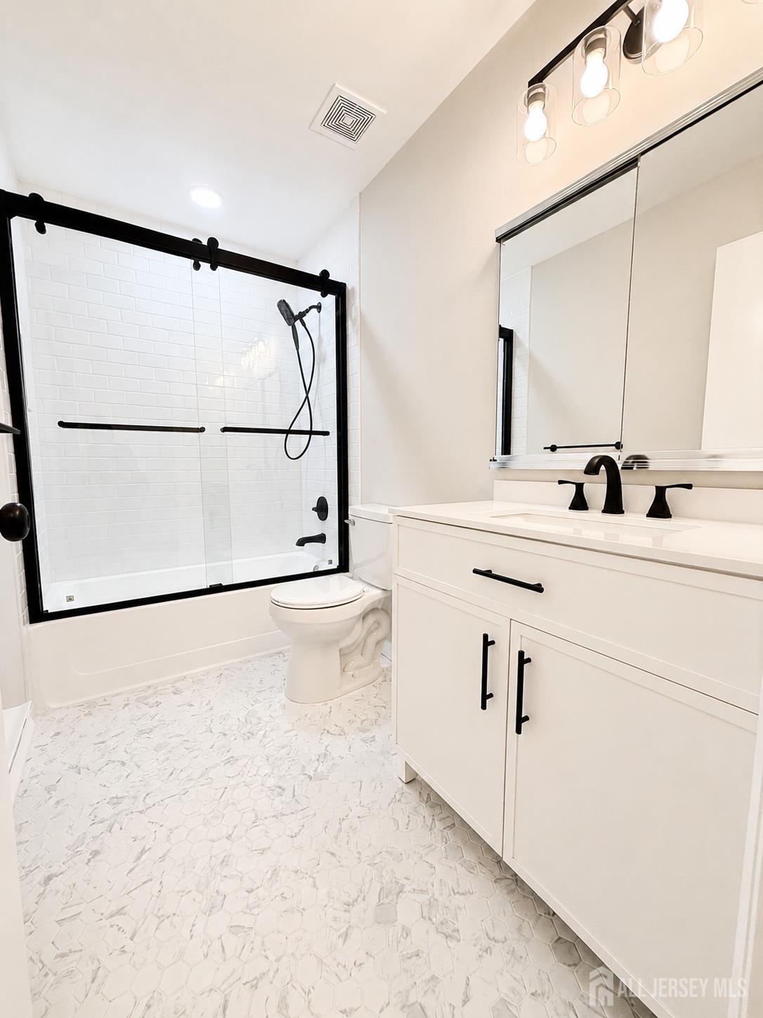 621 A Deal Road Monroe Township, NJ 08831 - Photo 15 of 27 a bathroom with a sink and a mirror