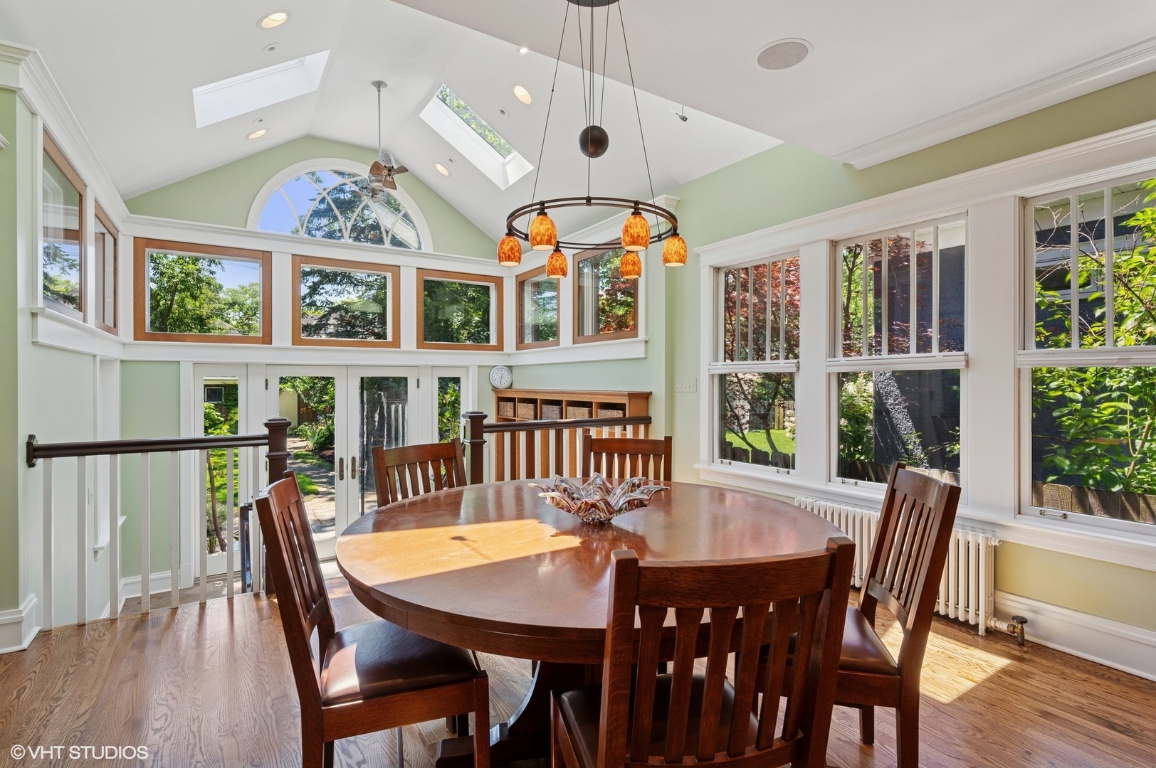 623 Forest Avenue Wilmette, IL 60091 - Photo 12 of 43 a view of a dining room with furniture window and wooden floor