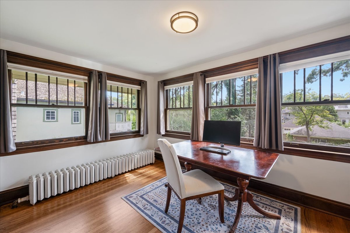 623 Forest Avenue Wilmette, IL 60091 - Photo 18 of 43 a view of a workspace with furniture and a window