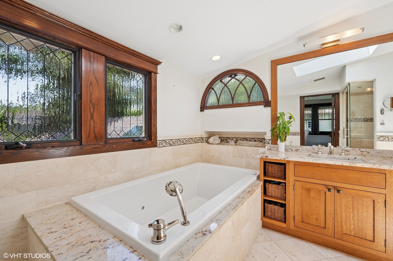 623 Forest Avenue Wilmette, IL 60091 - Photo 20 of 43 a bath tub sitting next to a window
