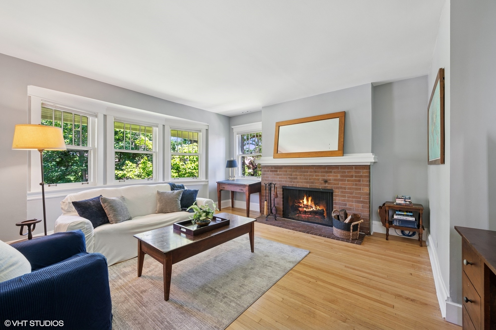 623 Forest Avenue Wilmette, IL 60091 - Photo 23 of 43 a living room with furniture and a fireplace