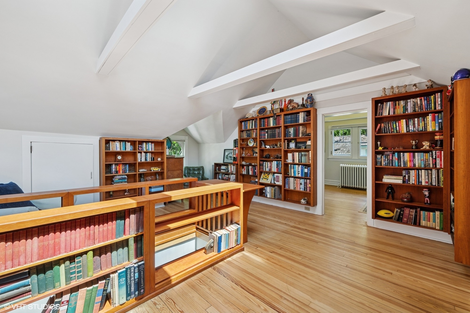623 Forest Avenue Wilmette, IL 60091 - Photo 25 of 43 a living room with furniture and a book shelf