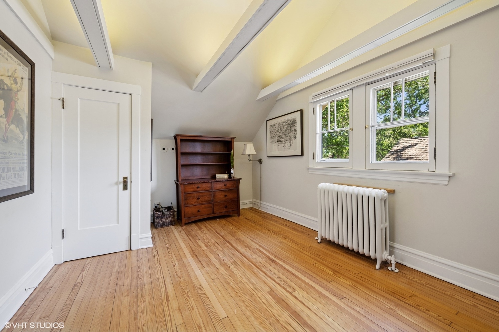 623 Forest Avenue Wilmette, IL 60091 - Photo 27 of 43 a view of a room with wooden floor and windows