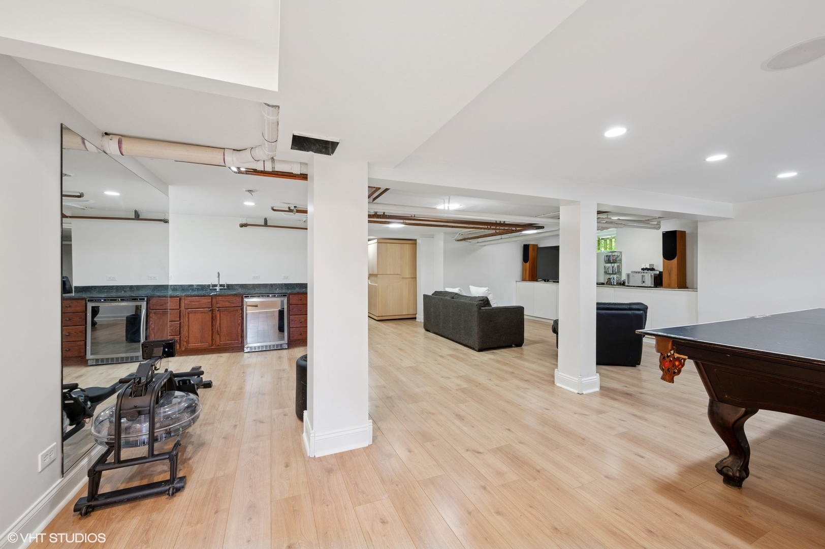 623 Forest Avenue Wilmette, IL 60091 - Photo 30 of 43 a living room with furniture and kitchen view