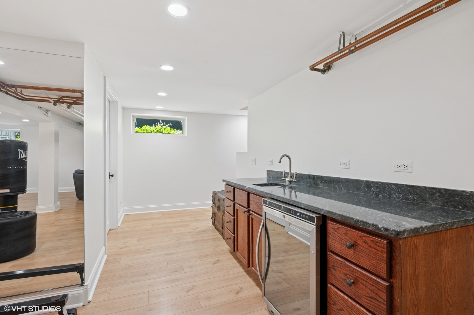 623 Forest Avenue Wilmette, IL 60091 - Photo 32 of 43 a kitchen with stainless steel appliances granite countertop a sink and a refrigerator