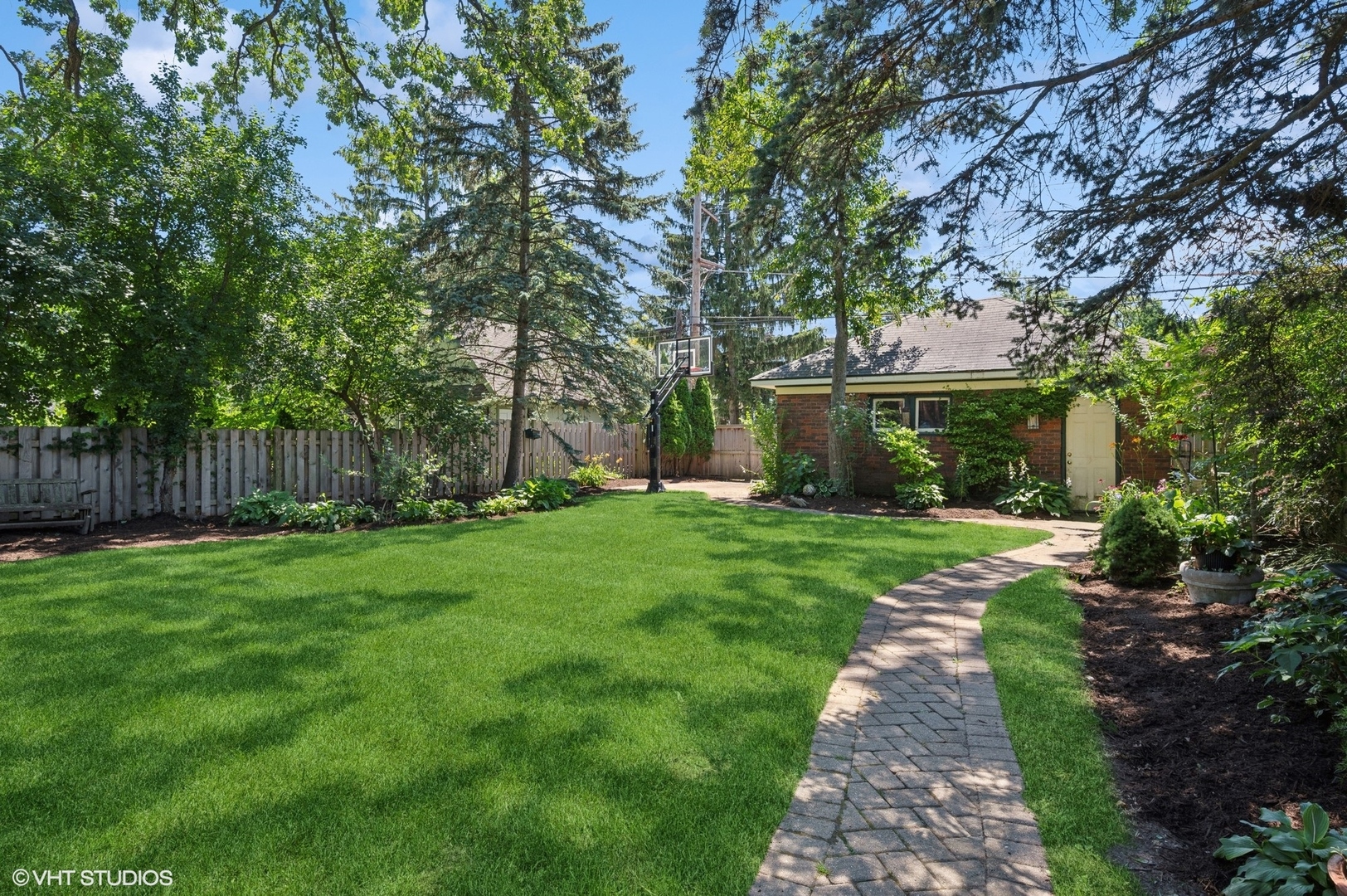 623 Forest Avenue Wilmette, IL 60091 - Photo 38 of 43 front view of a house with a yard