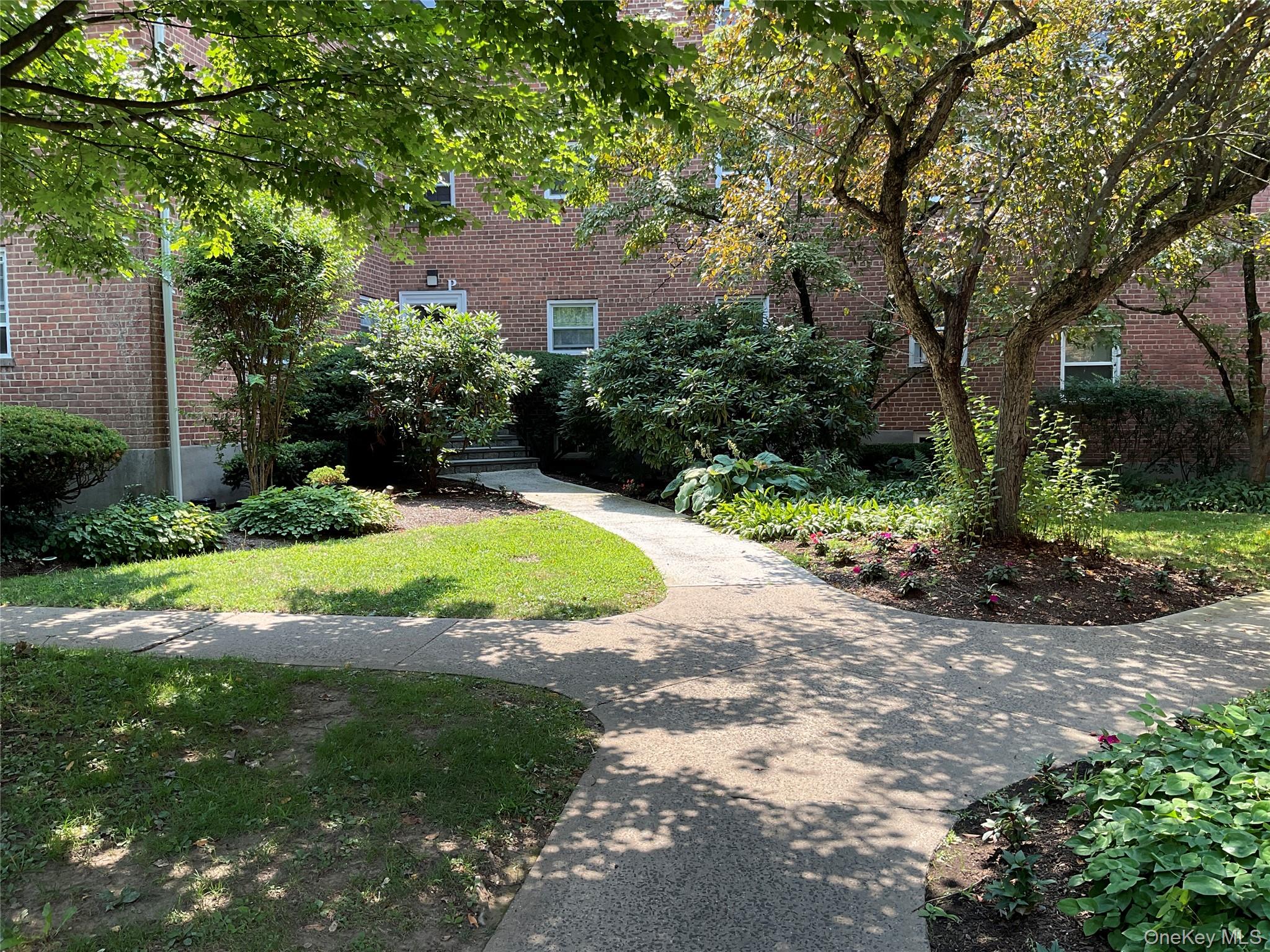 320 South Broadway, Unit P8 Tarrytown, NY 10591 - Photo 3 of 21 a view of a swimming pool with a yard