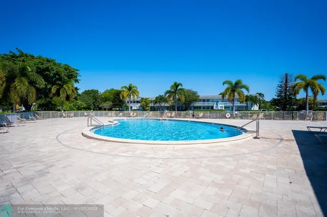 a view of a park with of a house