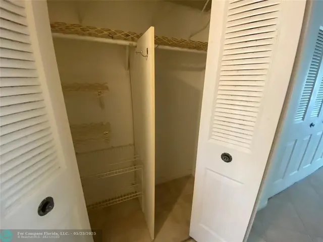 a bathroom with a tub and shower