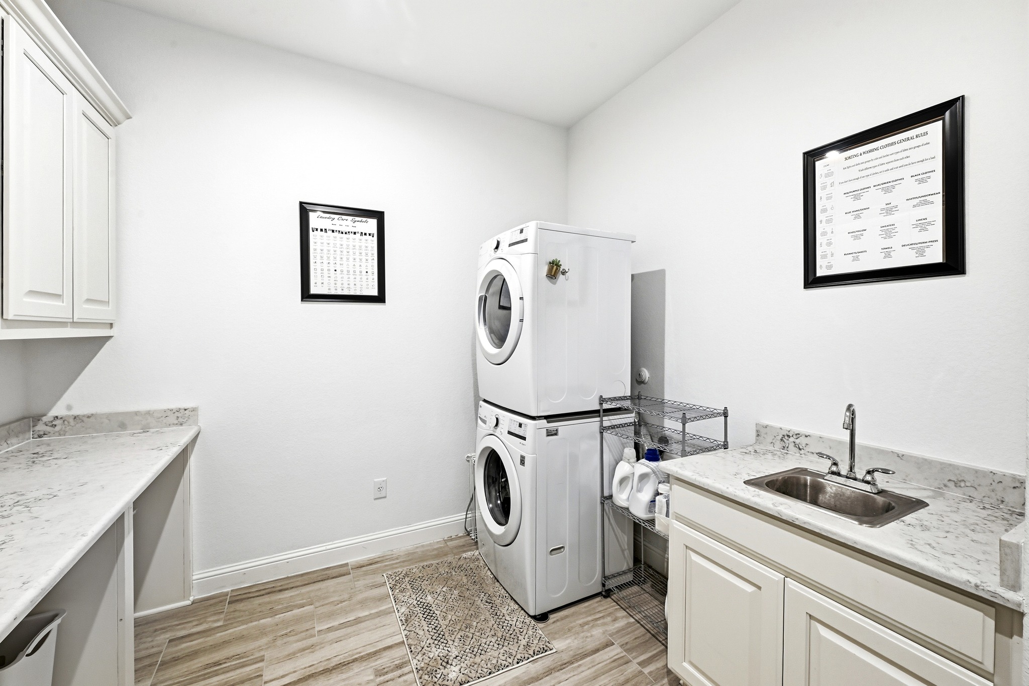 4601 Apollonia Way Leander, TX 78641 - Photo 34 of 40 a utility room with sink dryer and washer