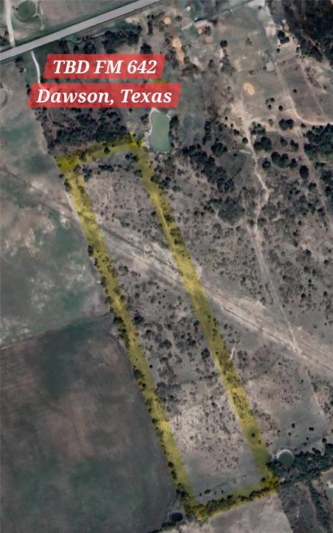 a view of a street with a yard