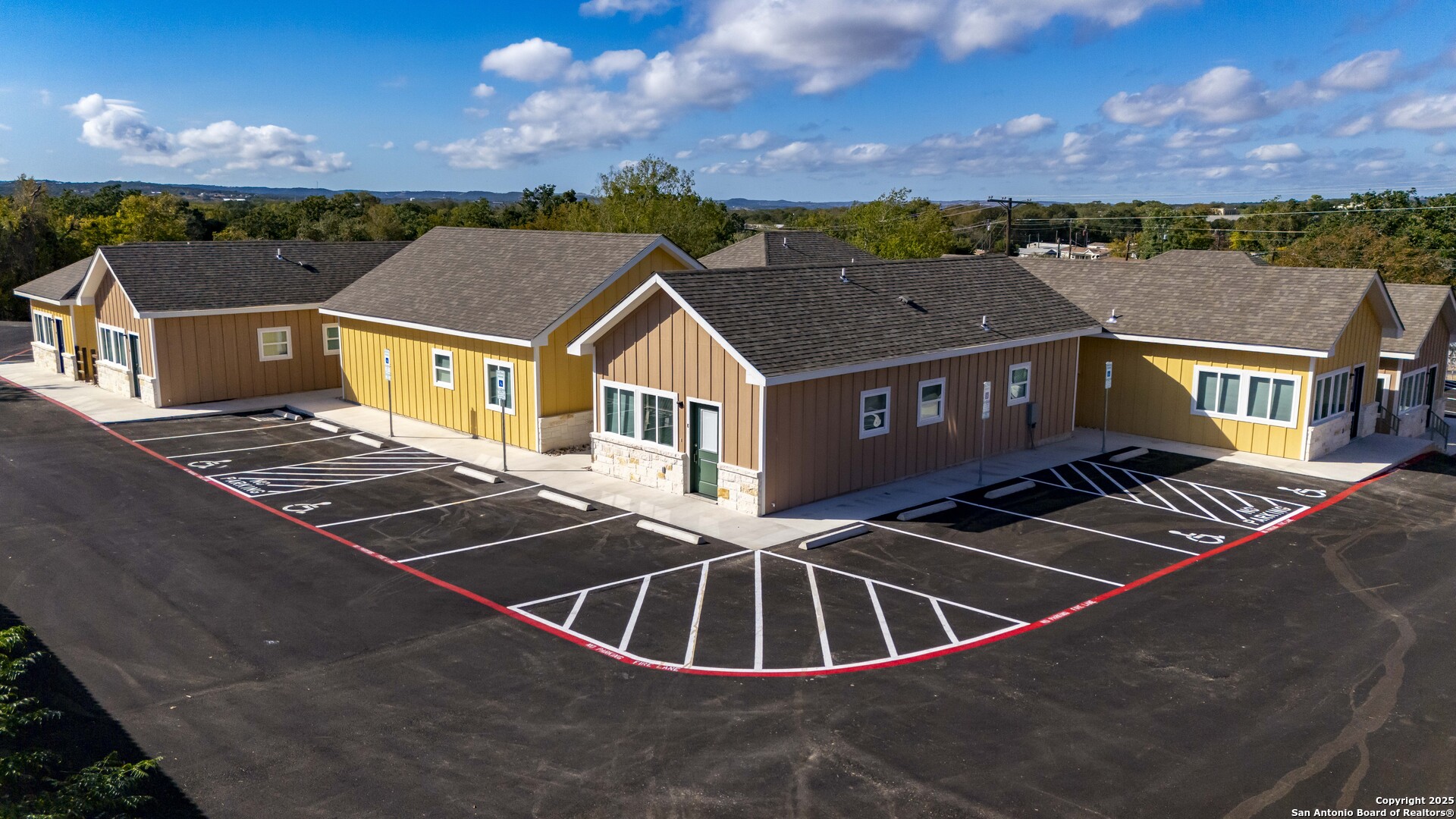 705 Fifth Street, Unit B Comfort, TX 78013 - Photo 14 of 30 an aerial view of houses with deck