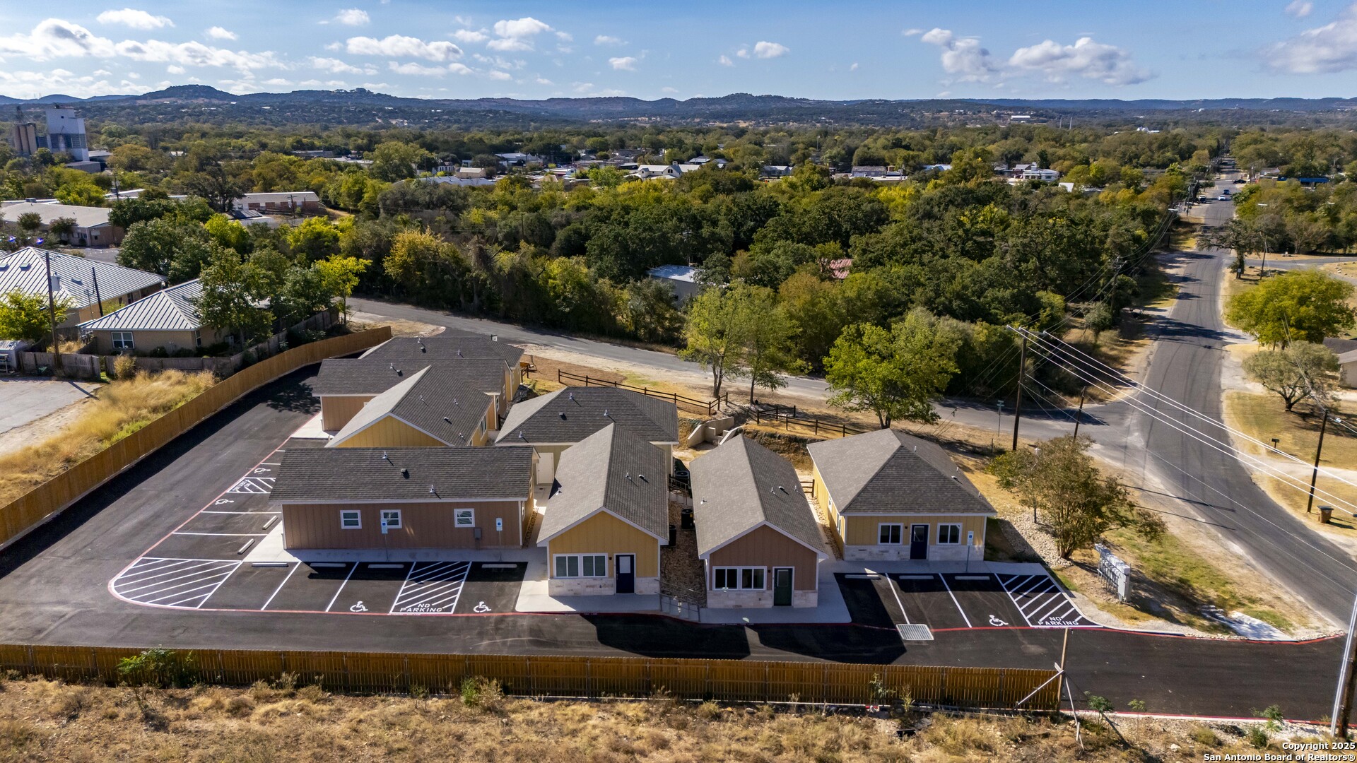 705 Fifth Street, Unit B Comfort, TX 78013 - Photo 16 of 30 a view of a city with lawn chairs