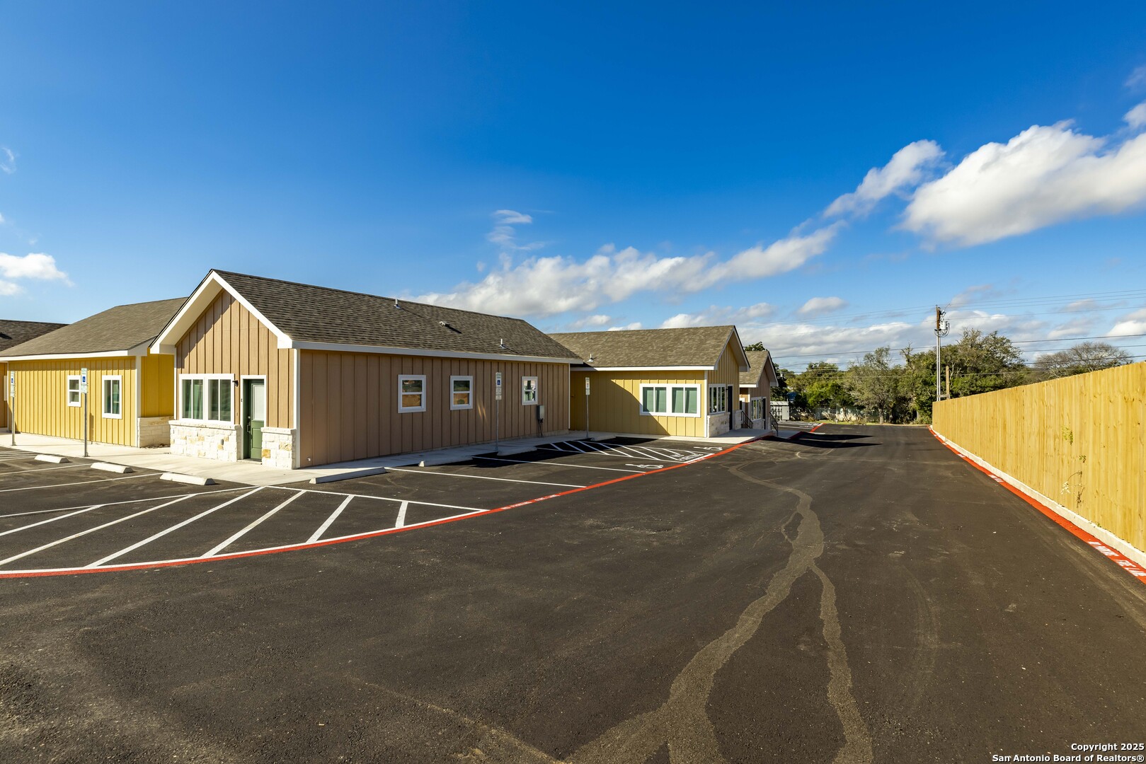 705 Fifth Street, Unit B Comfort, TX 78013 - Photo 9 of 30 a front view of a house with a yard