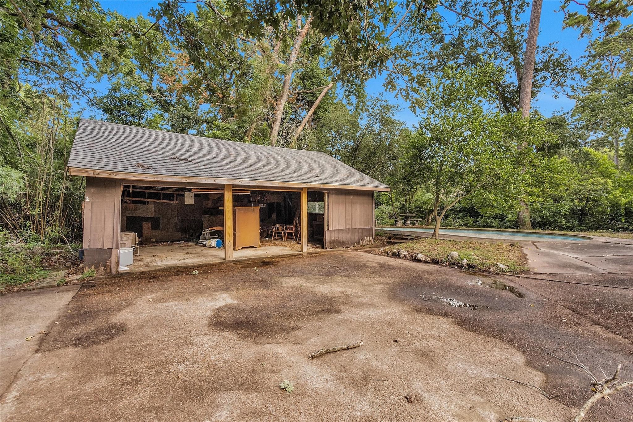 29526 West Hawthorne Drive Spring, TX 77386 - Photo 12 of 13 a front view of a house with a garden