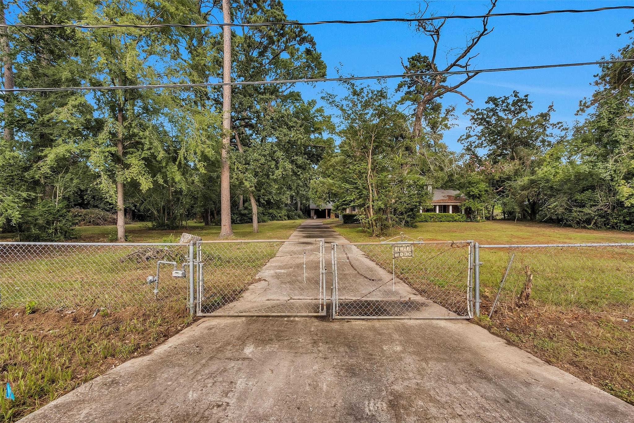 29526 West Hawthorne Drive Spring, TX 77386 - Photo 6 of 13 a view of a swimming pool with an outdoor space