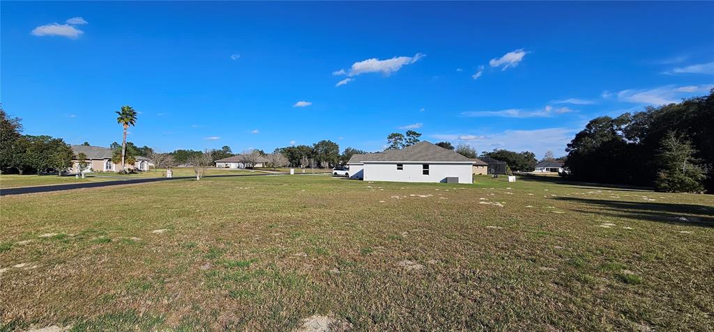 70th Street Silver Springs, FL 34488 - Photo 20 of 30 a view of a house with a yard