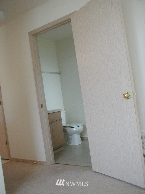 12116 Alexander Road Everett, WA 98204 - Photo 8 of 16 a white toilet sitting in a bathroom