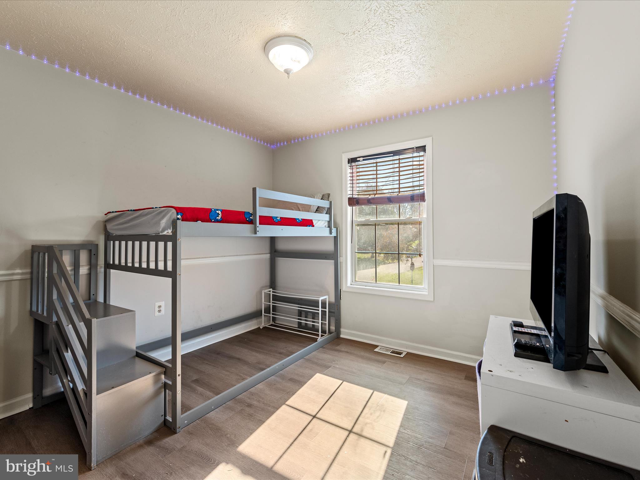521 East 11th Avenue Ranson, WV 25438 - Photo 16 of 41 a room with a desk and chair