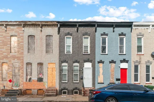 a car parked in front of a building