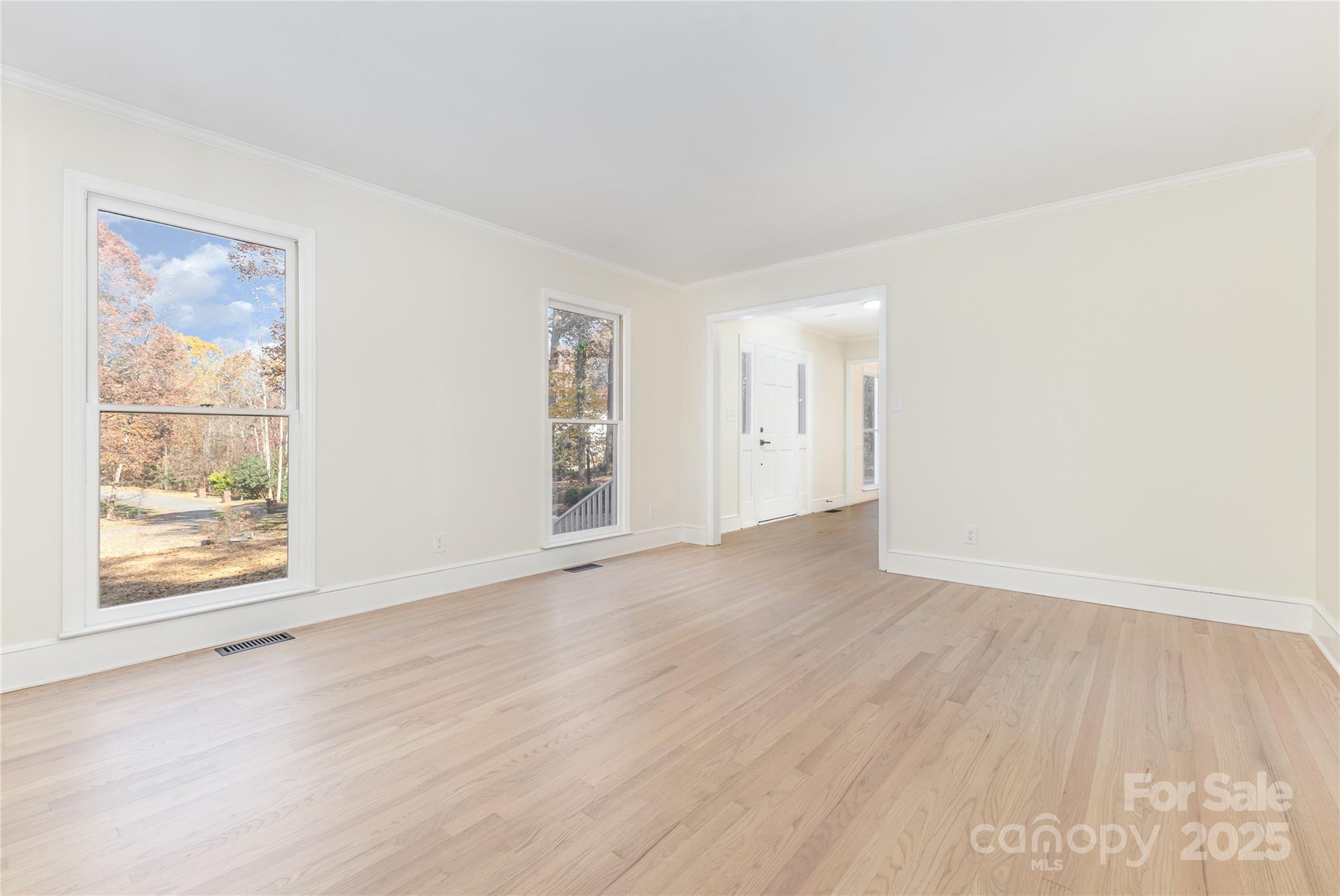 3335 Carnegie Lane Matthews, NC 28105 - Photo 26 of 31 an empty room with wooden floor and windows