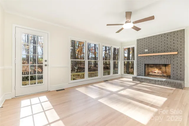 a bedroom with a large bed and a large window