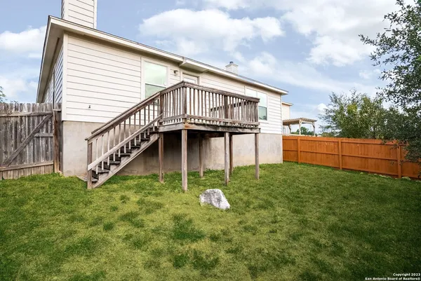 a front view of a house with a garage