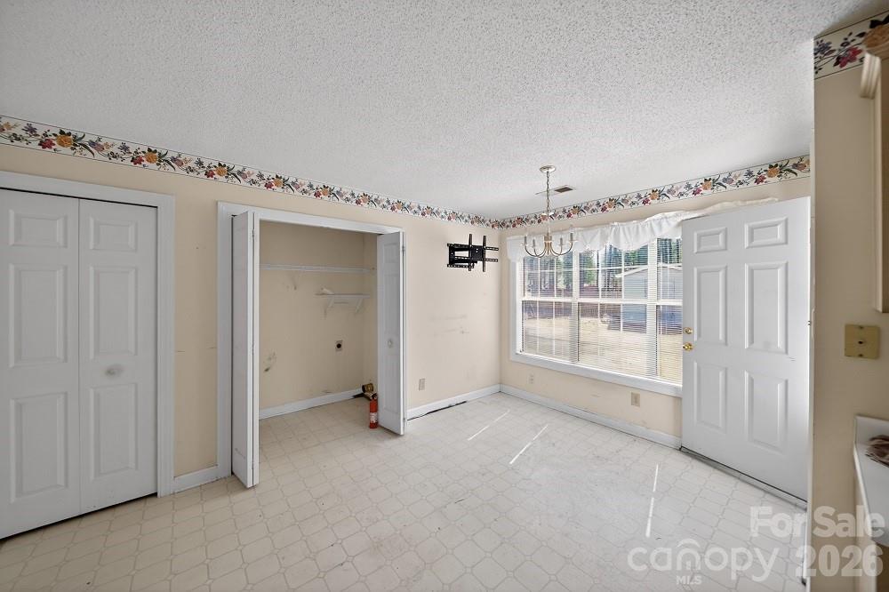 2205 Old Sparta Road Rocky Mount, NC 27804 - Photo 9 of 25 a view of an empty room
