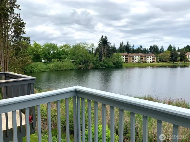 a view of a lake from a balcony
