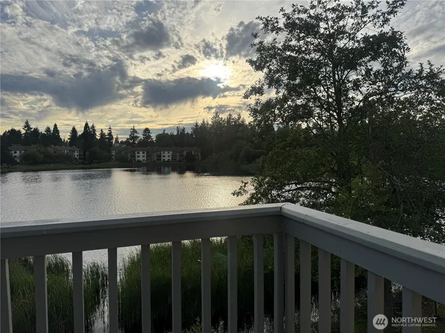 a view of a balcony with lake view