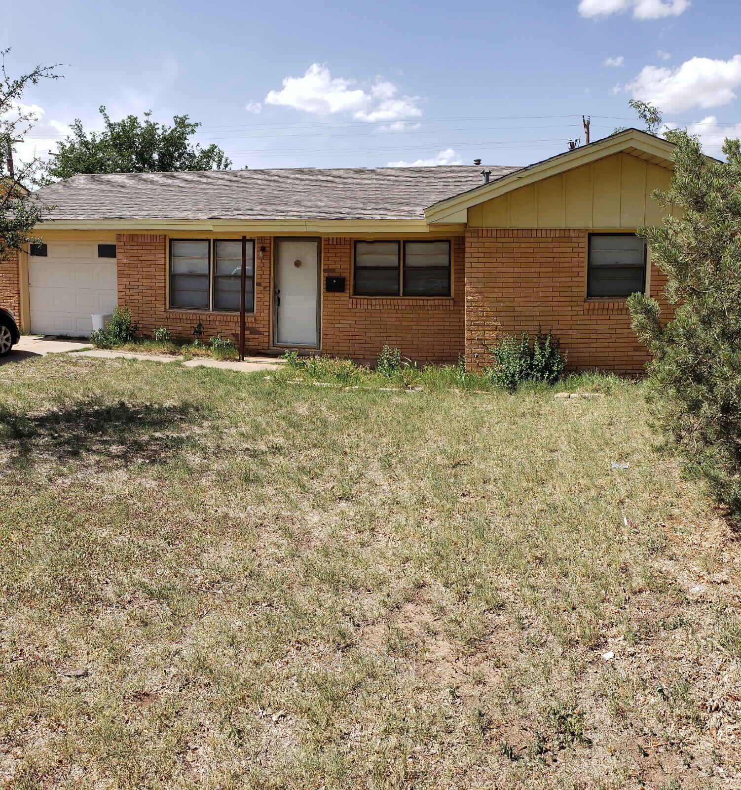 4906 6th Street Lubbock, TX 79416 - Photo 13 of 24 a view of a house with a yard
