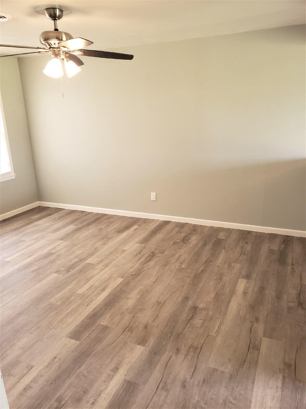 4906 6th Street Lubbock, TX 79416 - Photo 14 of 24 wooden floor in a empty room