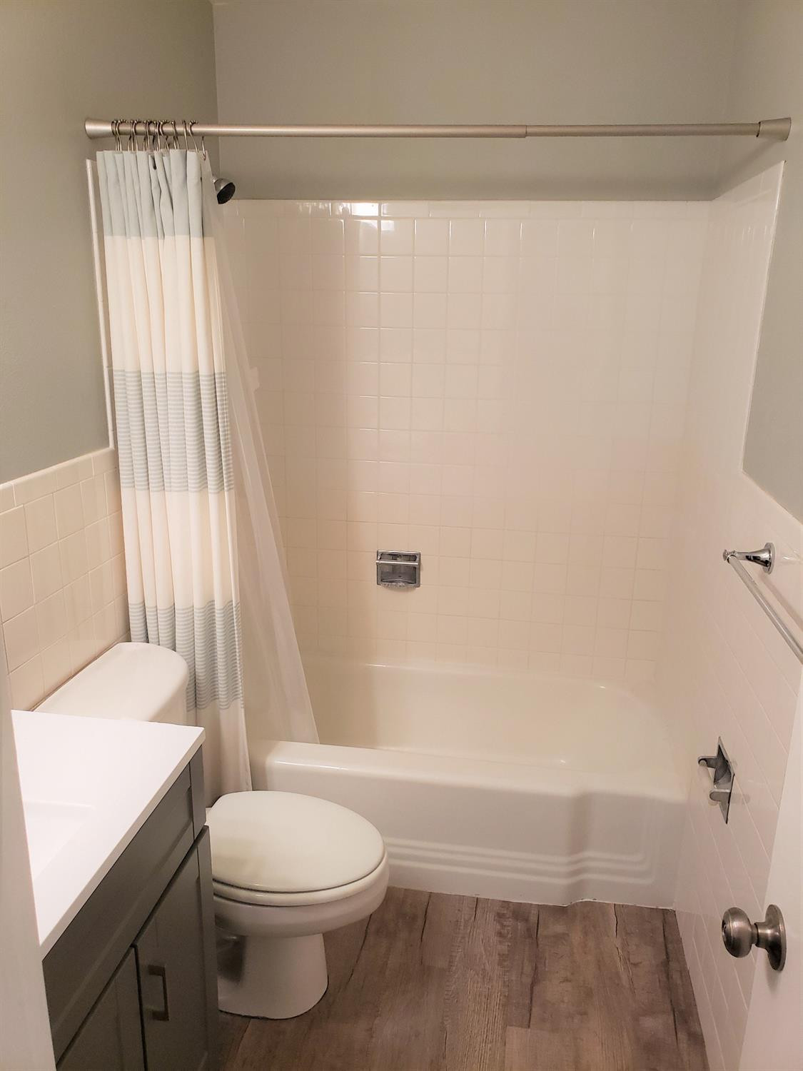 4906 6th Street Lubbock, TX 79416 - Photo 10 of 24 a bathroom with a sink and a toilet