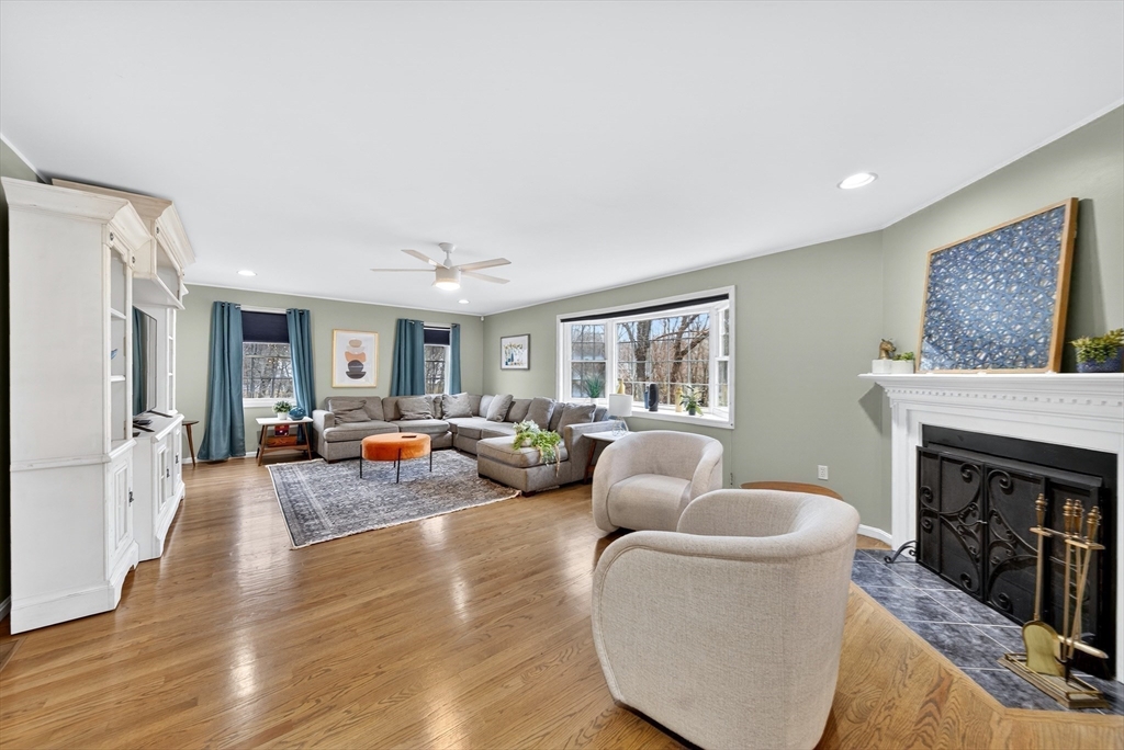 2 Hitching Post Lane Methuen, MA 01844 - Photo 11 of 40 a living room with furniture and a fireplace