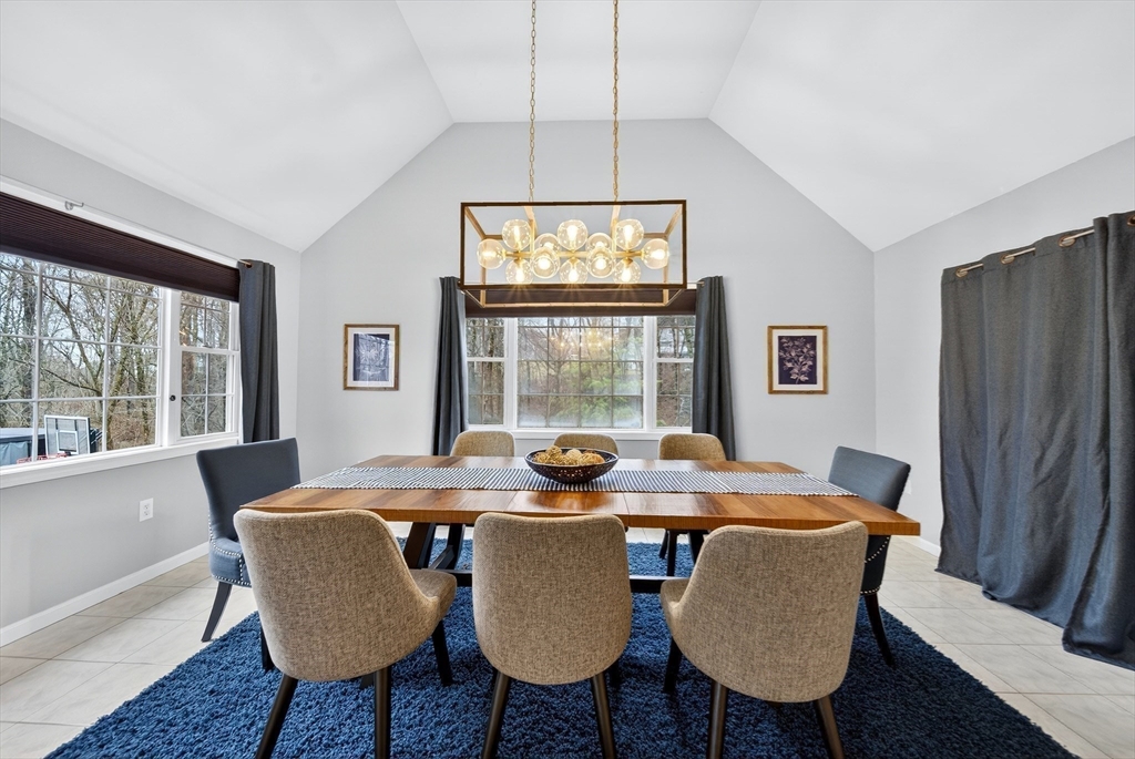 2 Hitching Post Lane Methuen, MA 01844 - Photo 14 of 40 a view of a dining room with furniture window and outside view