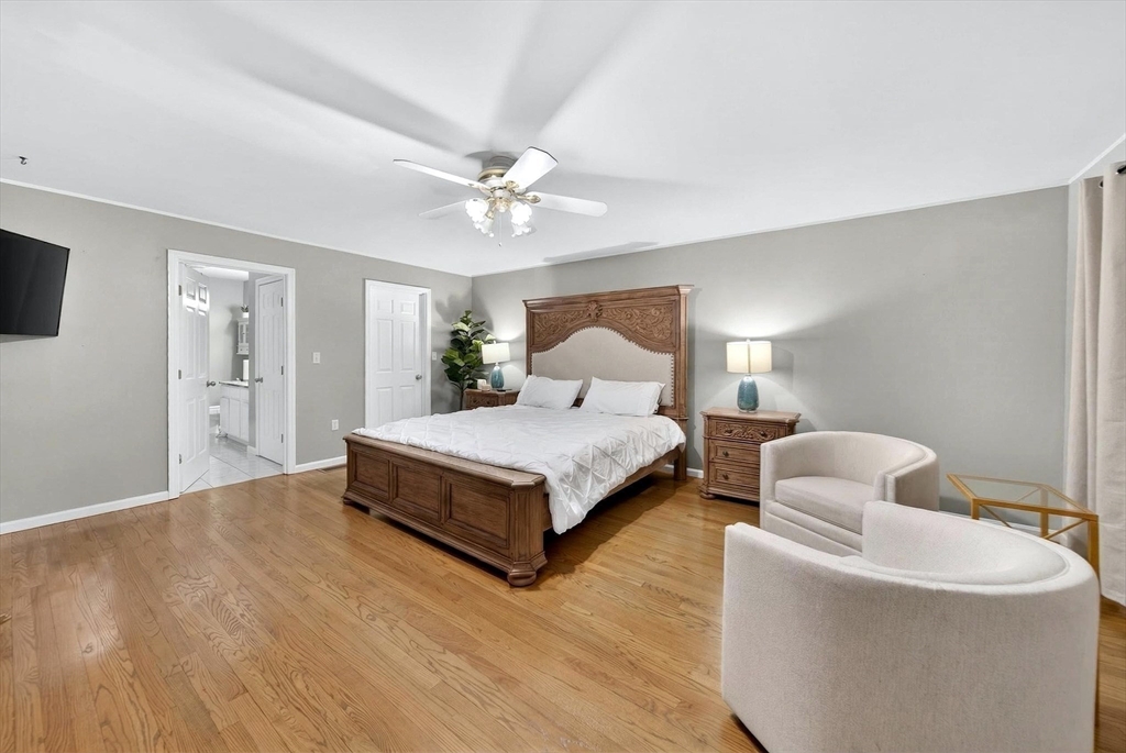 2 Hitching Post Lane Methuen, MA 01844 - Photo 17 of 40 a spacious bedroom with a bed and window