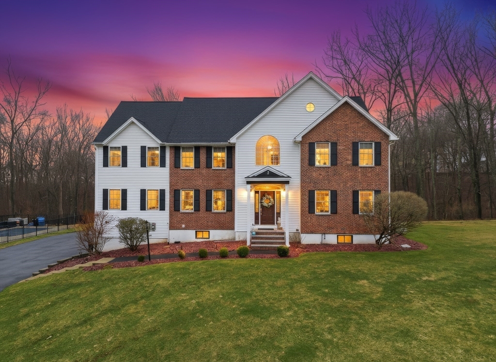 2 Hitching Post Lane Methuen, MA 01844 - Photo 2 of 40 a front view of a house with garden