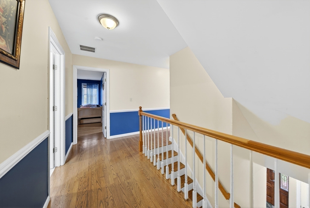 2 Hitching Post Lane Methuen, MA 01844 - Photo 22 of 40 a view of entryway and hall with wooden floor