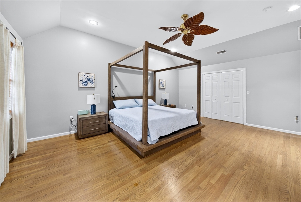 2 Hitching Post Lane Methuen, MA 01844 - Photo 27 of 40 a bedroom with a bed and a ceiling fan