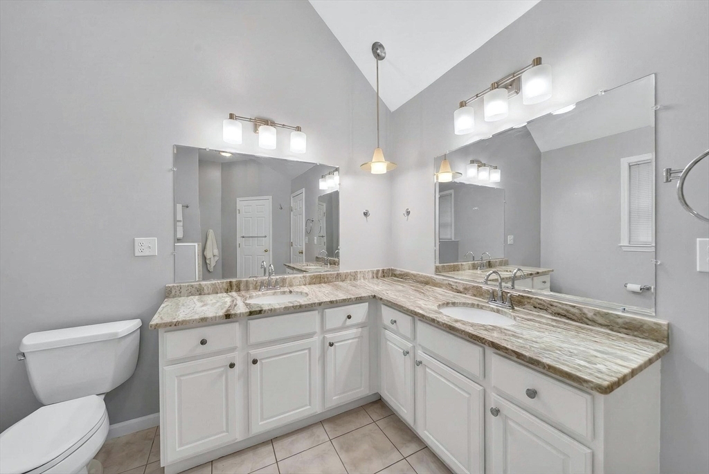 2 Hitching Post Lane Methuen, MA 01844 - Photo 30 of 40 a bathroom with a granite countertop double vanity sink a toilet and a mirror