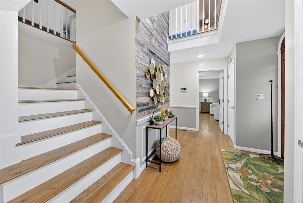 2 Hitching Post Lane Methuen, MA 01844 - Photo 5 of 40 a view of entryway and hall with wooden floor