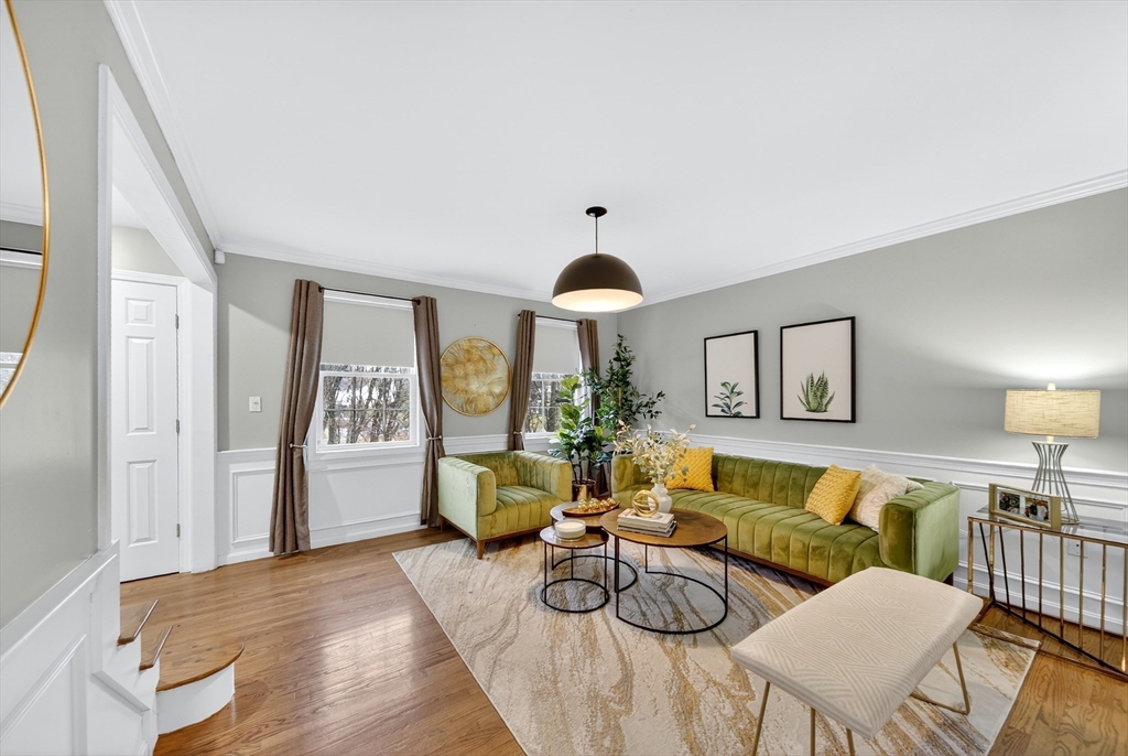 2 Hitching Post Lane Methuen, MA 01844 - Photo 6 of 40 a living room with furniture and a wooden floor