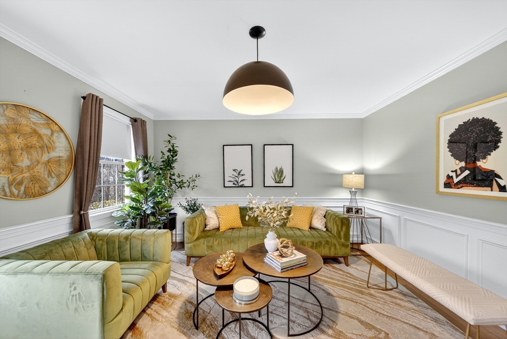 2 Hitching Post Lane Methuen, MA 01844 - Photo 7 of 40 a living room with furniture and a potted plant