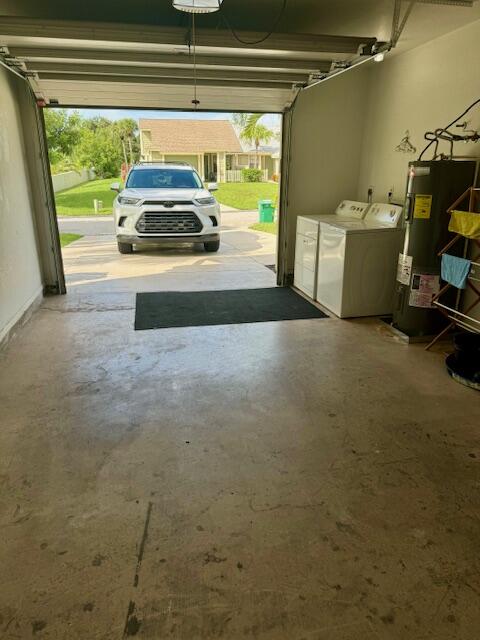 Undisclosed Address Port St. Lucie, FL 34952 - Photo 24 of 34 a view of car parked in garage