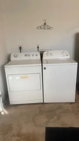 a view of lake with a yard