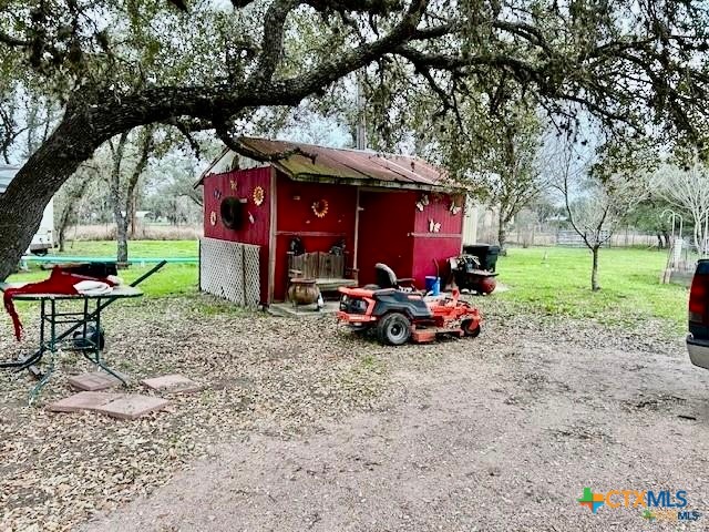 103 Forest View Drive Victoria, TX 77905 - Photo 16 of 20 a view of a yard with a car parked in it