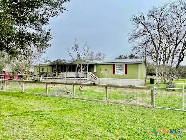 103 Forest View Drive Victoria, TX 77905 - Photo 6 of 20 a front view of a house with a yard