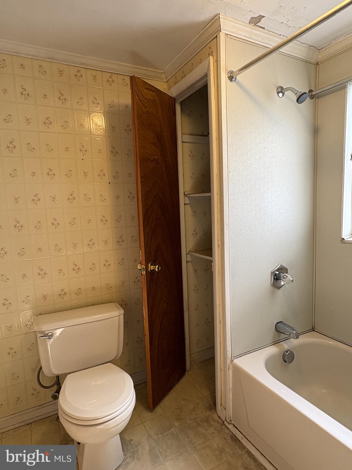 119 Maffitt Street, Unit 4 Elkton, MD 21921 - Photo 15 of 17 a white toilet sitting next to a bath tub