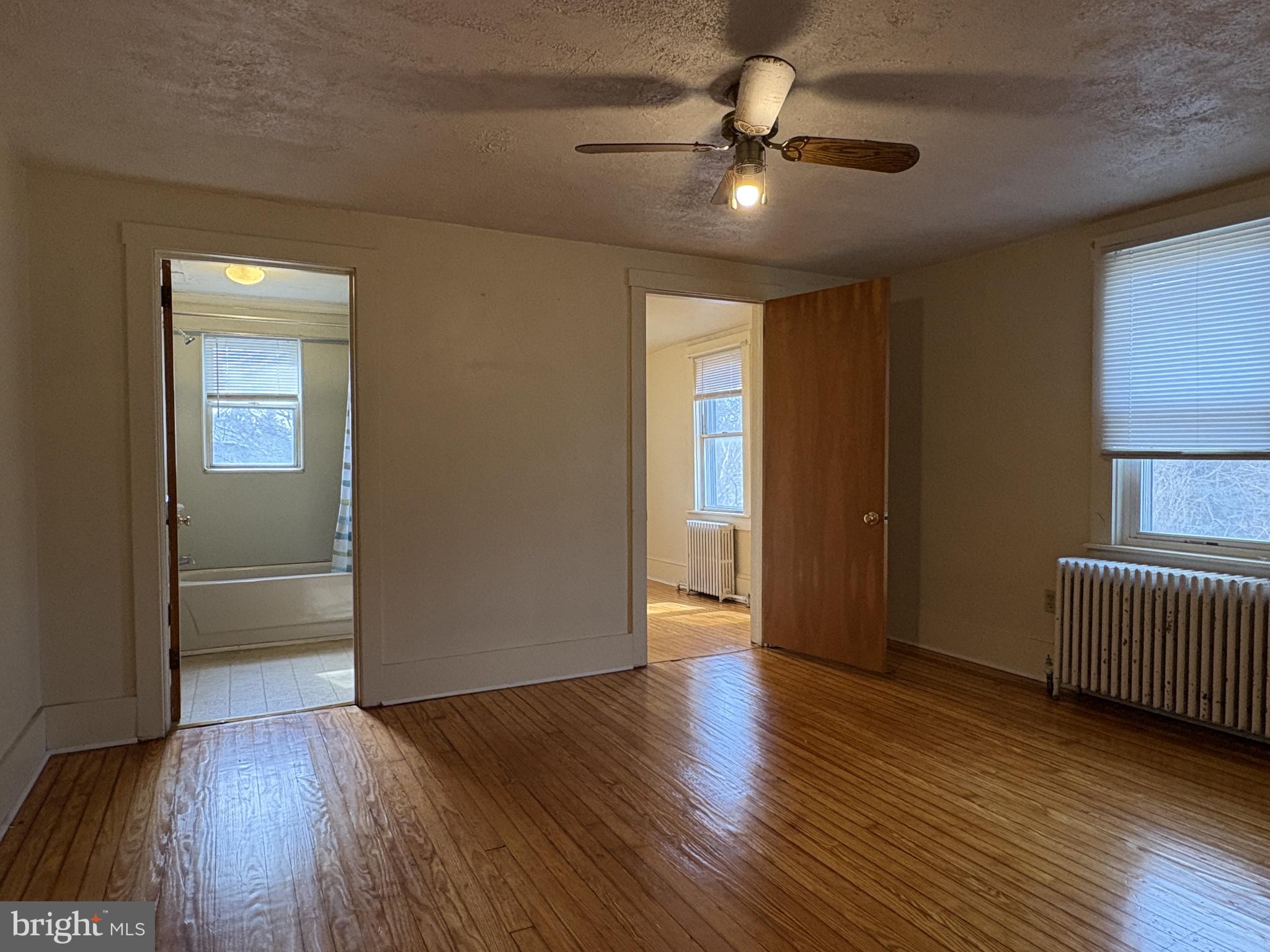 119 Maffitt Street, Unit 4 Elkton, MD 21921 - Photo 7 of 17 wooden floor in an empty room with a window